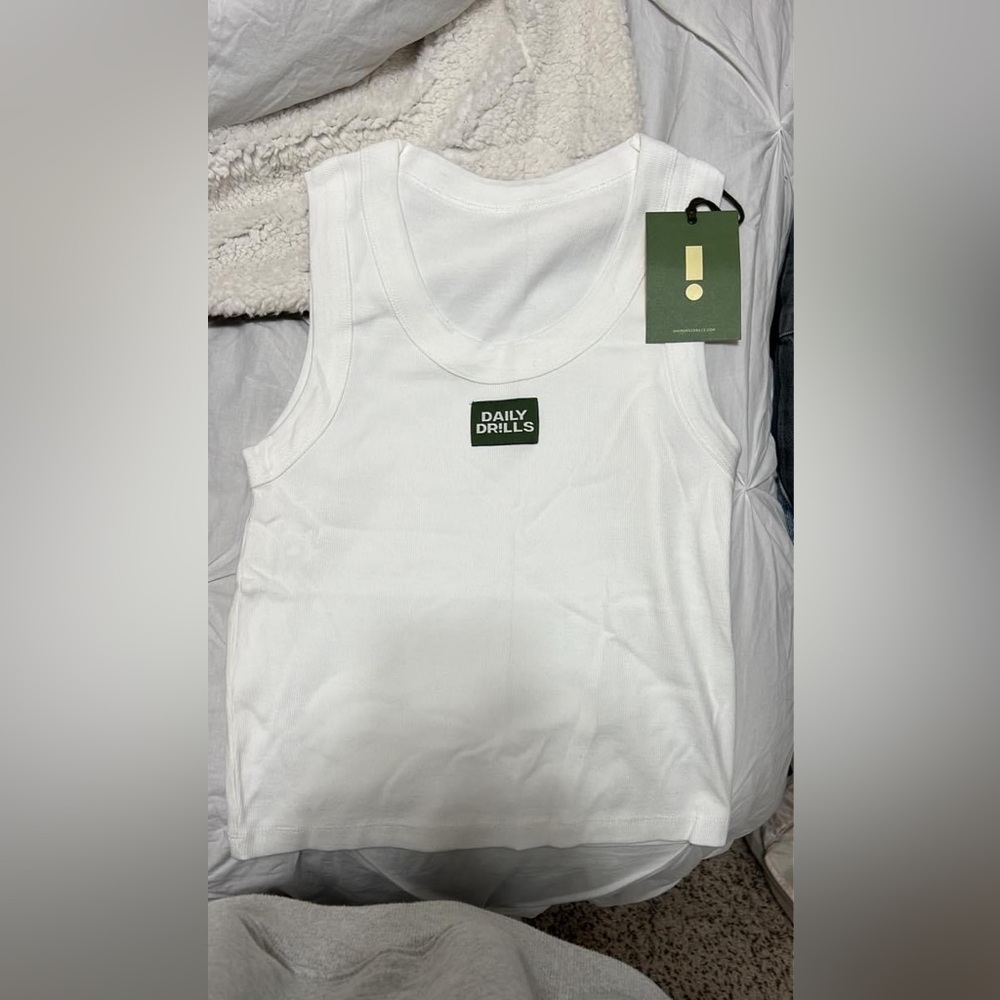 Daily drills logo tank